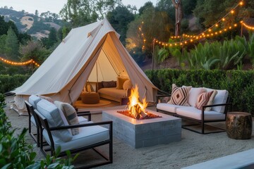Glamping offers a luxury camping experience.A cozy outdoor setting features a tent, comfortable seating, and a warm fire pit surrounded by greenery and decorative string lights.