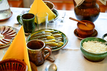 Traditional Latvian table setting with bread, bacon, pickles and soup as lunch for visitors to the Aglona Bread Museum, Aglonas Maizes muzejs in Aglona, ​​Latvia
