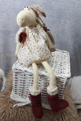 doll in a chair