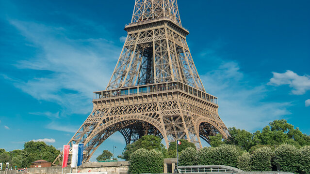 The Eiffel tower timelapse from waterfront at the river Seine in Paris