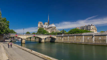 Seine and Notre Dame de Paris timelapse hyperlapse is the one of the most famous symbols of Paris