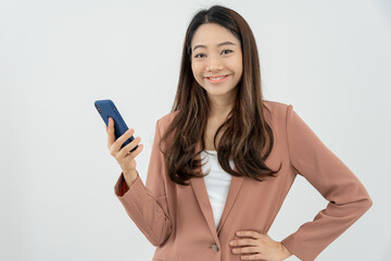 Naklejka premium Asian beautiful woman exited surprise face expression . female feels shocked. exciting smile and happy adorable rejoices. Very enjoy and fun relax time. wow, girl holding smartphone. Smile.