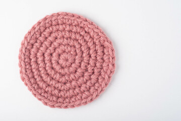 A pink single crochet circle