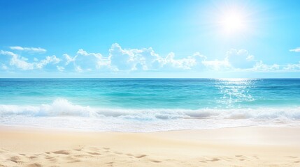 Obraz premium A picturesque view of a pristine sandy beach with foamy waves lapping at the shore, under a bright blue sky with fluffy white clouds and the sun shining brightly.