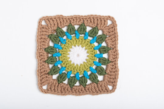 Green, blue and brown crochet granny square