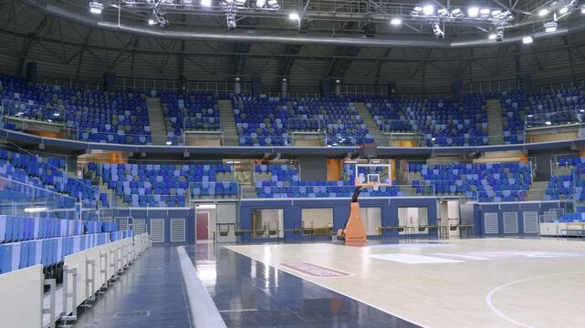 Empty Basketball Court - 4K - Arena, Stadium, Indoors, Game, Competition, Athletic, Exercise, Fitness, Hoop, Net, Bleachers, Seats, No People, Wide Shot