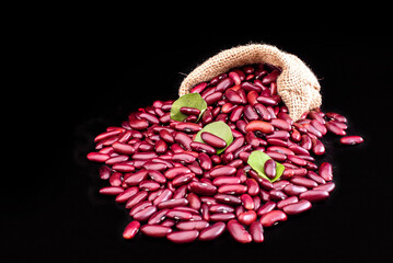 Close-up of red kidney beans on a dark background