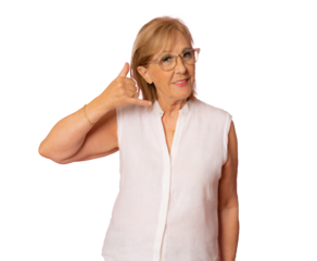 Smiling senior woman doing phone gesture with hand and fingers like talking on the telephone over transparent background. Communicating concepts.