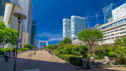 Fototapeta premium Skyscrapers of La Defense timelapse hyperlapse - Modern business and residential area in the near suburbs of Paris, France.