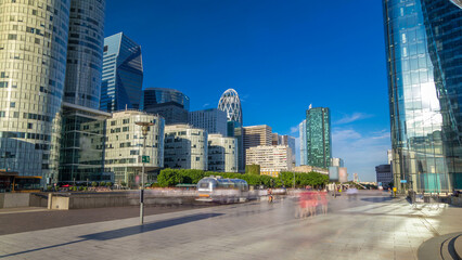 Fototapeta premium Skyscrapers of La Defense timelapse hyperlapse - Modern business and residential area in the near suburbs of Paris, France.