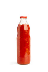 A bottle full of tomato sauce on a white background with copy space