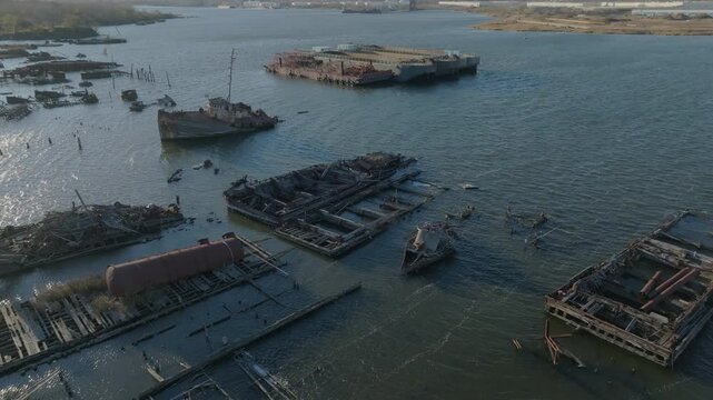another flying backwards over Staten Island Boat Graveyard