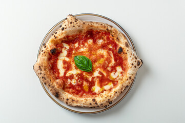 Typical Italian margherita pizza from above isolated on white background