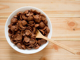 Chocolate breakfast cereal in a white bowl