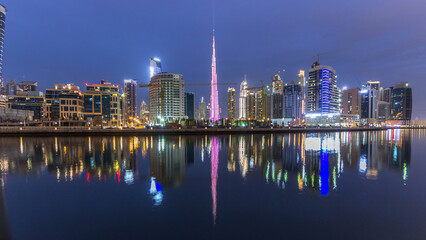Obraz premium Dubai business bay towers day to night timelapse