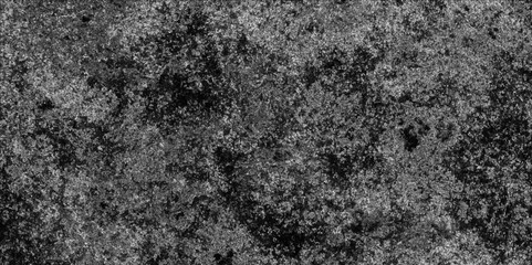 Scattered heavy grunge texture on a dark concrete wall surface. Dark cement wall in retro concept. Black and white concrete texture for abstract background. distressed Rough Black cracked wall slate	