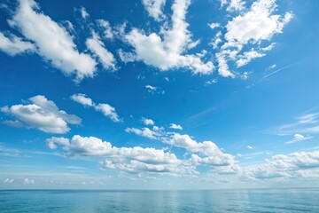 A serene blue sky with a few white clouds scattered across it, creating a sense of tranquility and peacefulness, fluffy, nature, blue sky