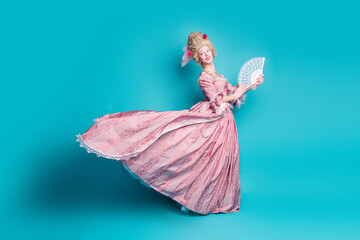 Photo of charming elegant duchess wear corset ball gown hold fan carnival empty space isolated on...