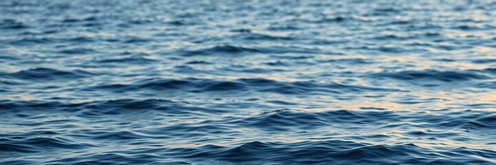 Naklejka premium Navy blue and soft gold colors blend together to create a beautiful, calming ocean scene with gentle waves, shoreline, beachy