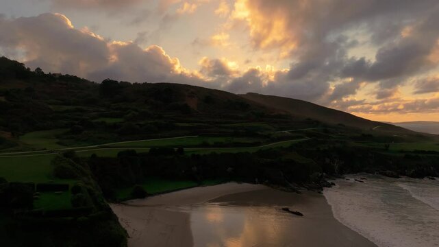 Caion Beach Nearby Coast And Mountain Under The Dramatic Sky In La Coru&ntilde;a, Spain. aerial, upward shot