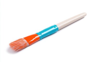 Fototapeta premium A vibrant paintbrush with a colorful handle, designed for artists and DIY projects, showcasing creativity and artistic expression.