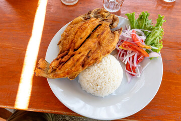 Grilled trout, typical dish of the highlands of Peru
