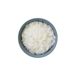 bowl of dried coconut chips grated raw