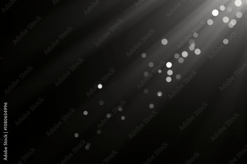 Sticker abstract light beams with sparkling dust: elegant black and white bokeh effect.