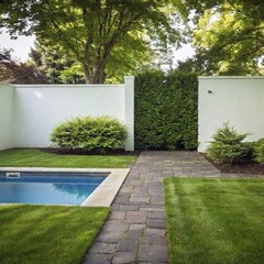 green yard with white and black fence