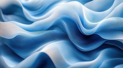 Obraz premium Soft blue fabric waves creating a serene, flowing texture.