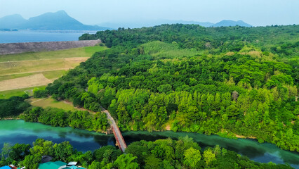 Aerial View of Jatiluhur, the Largest Dam in Indonesia. Bendungan Jatiluhur of Purwakarta. Multi-Purpose Embankment Dam on The Citarum River with Morning Glory Spillway