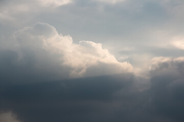 Obraz premium sky and clouds, Dramatic cloudy sky with rays in the background