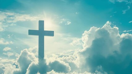 Christian cross in heaven background. Blue sky with white clouds and sunlight. Christianity and faith concept. Religious worship and religion. Church and pray
