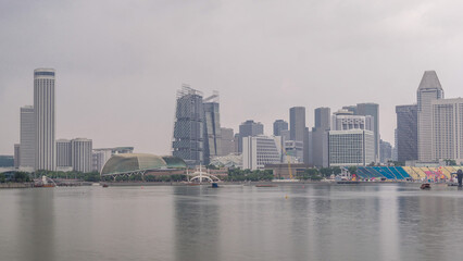 Obraz premium Skyline with skyscrapers of Marina Bay timelapse hyperlapse.