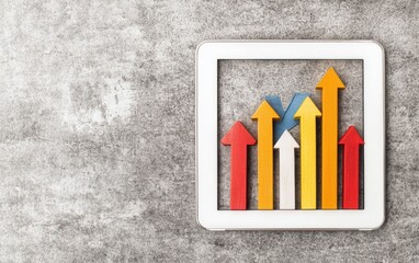 Tablet showing relevance metrics for keywords aligned with website SEO strategies