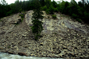 Fototapeta premium rocky hill by the river