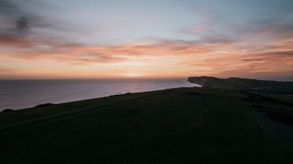 Evening view of the sea and an island in the dark and only the sky is shining