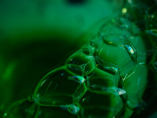 Green water bubbles close up macro shot 