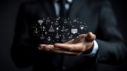 Naklejka premium Man in a suit holds out his hand with icons, Technology hologram digital icon on businessman hand