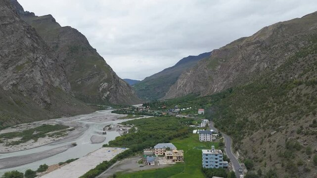 Aerial drone shot of Jispa, a city situated in mountains. 