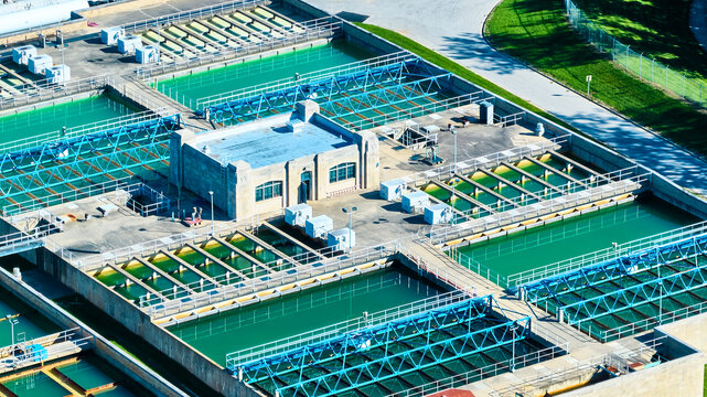 Aerial Water Treatment Facility Turquoise Basins and Industrial Design