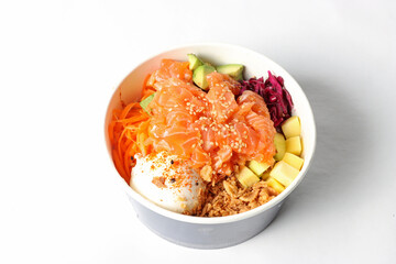 Salmon poke bowl in a studio setting
