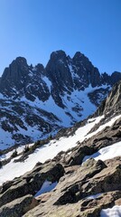 snow-covered stone mountain landscape