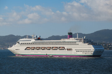 Classic British cruiseship cruise ship liner Ambience sail away departure from port of Vigo, Spain...