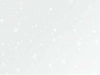 Delicate snowflakes gently falling against a serene winter backdrop in a tranquil landscape during a soft snowfall