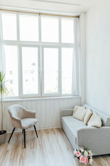 Interior of an empty white room with a window
