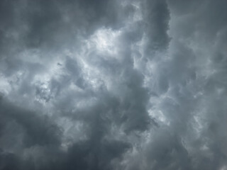 Dramatic, dark, blue expanse of cloudy sky, expanse of sky. Dramatic sky and lightning. Bad weather with dark clouds. Rain And Thunderstorm In Dramatic Sky