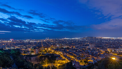 Panorama of Barcelona night to day timelapse, Spain, viewed from the Bunkers of Carmel