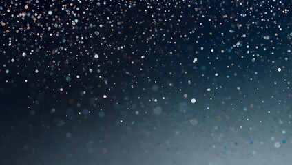 Obraz premium Many small, light-colored specks are falling against a dark, bluish background.