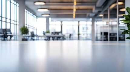 Fototapeta premium A blurred focus image of a white open space office interior.